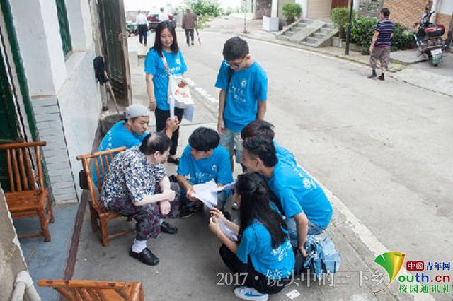 365英国上市官网志愿者探访老街 为灾后修复建言献策